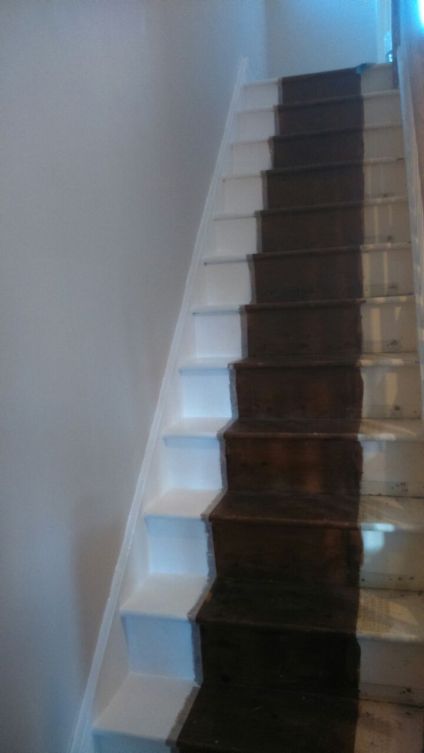 Stairs with one side painted (half a job Steve, that's half a job)